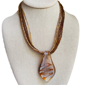 Beaded multi strand art glass pendant necklace translucent brown and silvertone